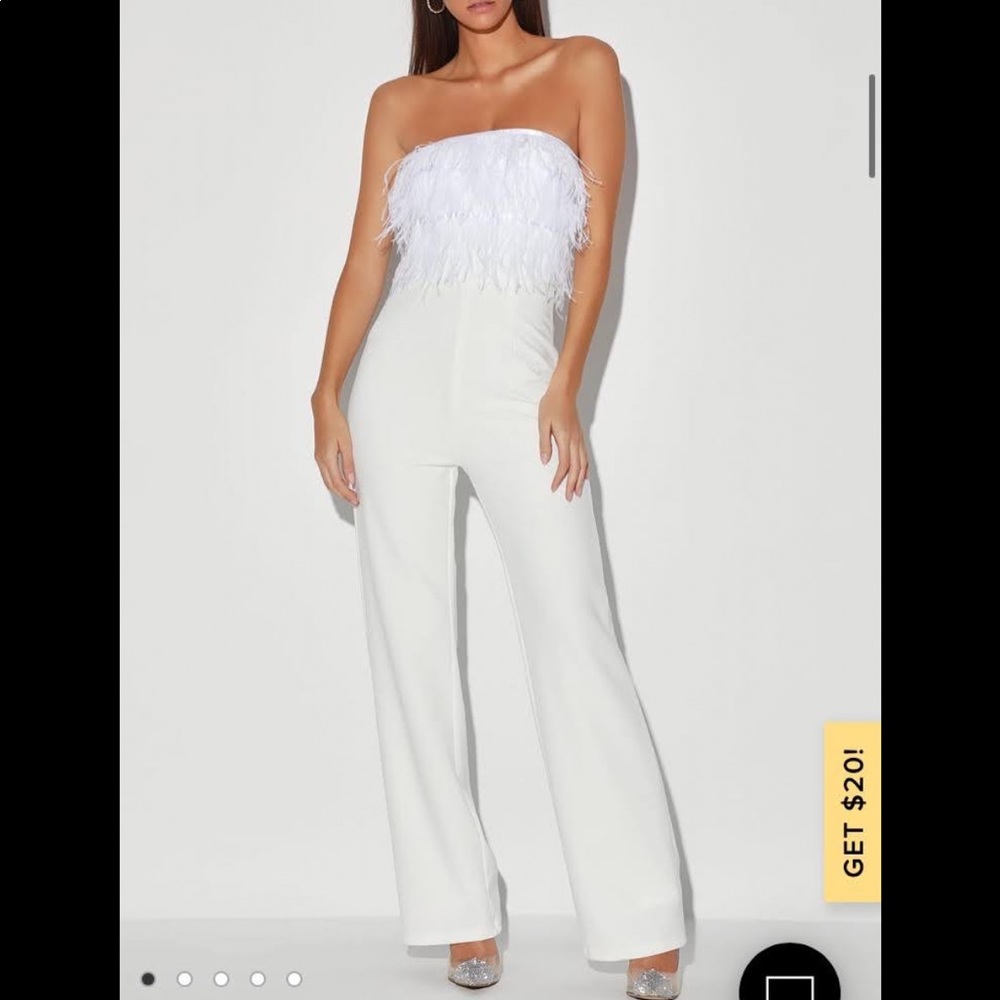 Like new full length jump suit. Strapless, white with feathers on bodice